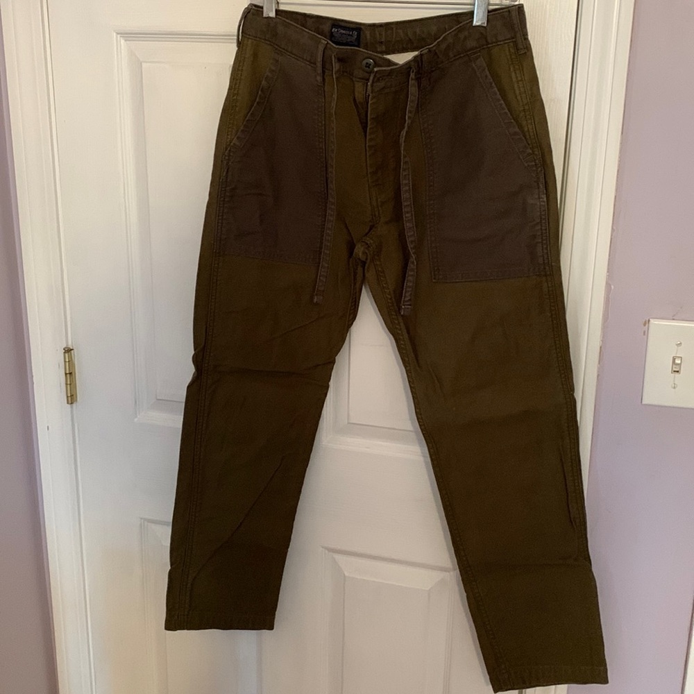 Green cotton pants. With zip, button. And drawstring. Size 6, loose fit.